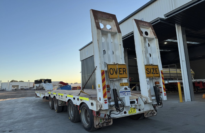 USED QUAD LOW LOADER FULL AXLE WIDENER—FOR SALE